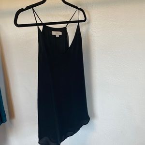 Loft, black camisole, hangs very nice, large petite. Could fit medium.